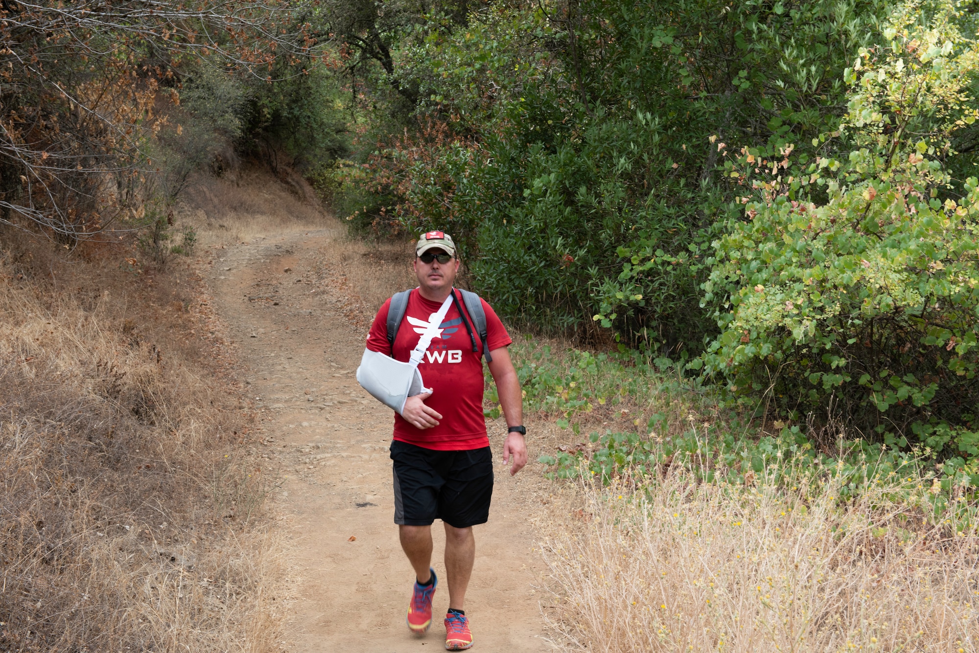 U.S. Air Force veteran Chris Coffelt, hikes along the Middle Fork American River Quarry Trail Aug. 16, 2020, in Auburn, California. Coffelt is participating in the Gold Star Families Ruck March, an annual event to honor gold star families and fallen service members. He dedicated the 11-mile hike to U.S. Army Spc. Wayne Geiger, who died Oct. 18, 2007 in Iraq. (U.S. Air Force photo by Tech. Sgt. James Hodgman)