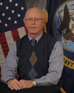 Official portrait of Mr. David Beach, director, Naval Computer and Telecommunications Station Far East Detachment Misawa, Japan.