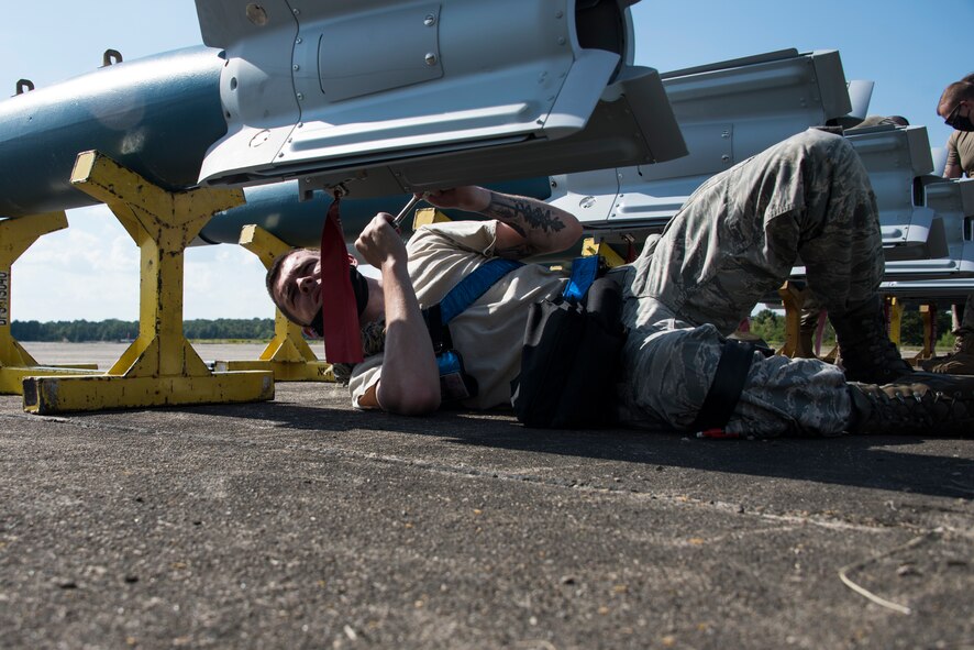 A photo of Airmen building bombs