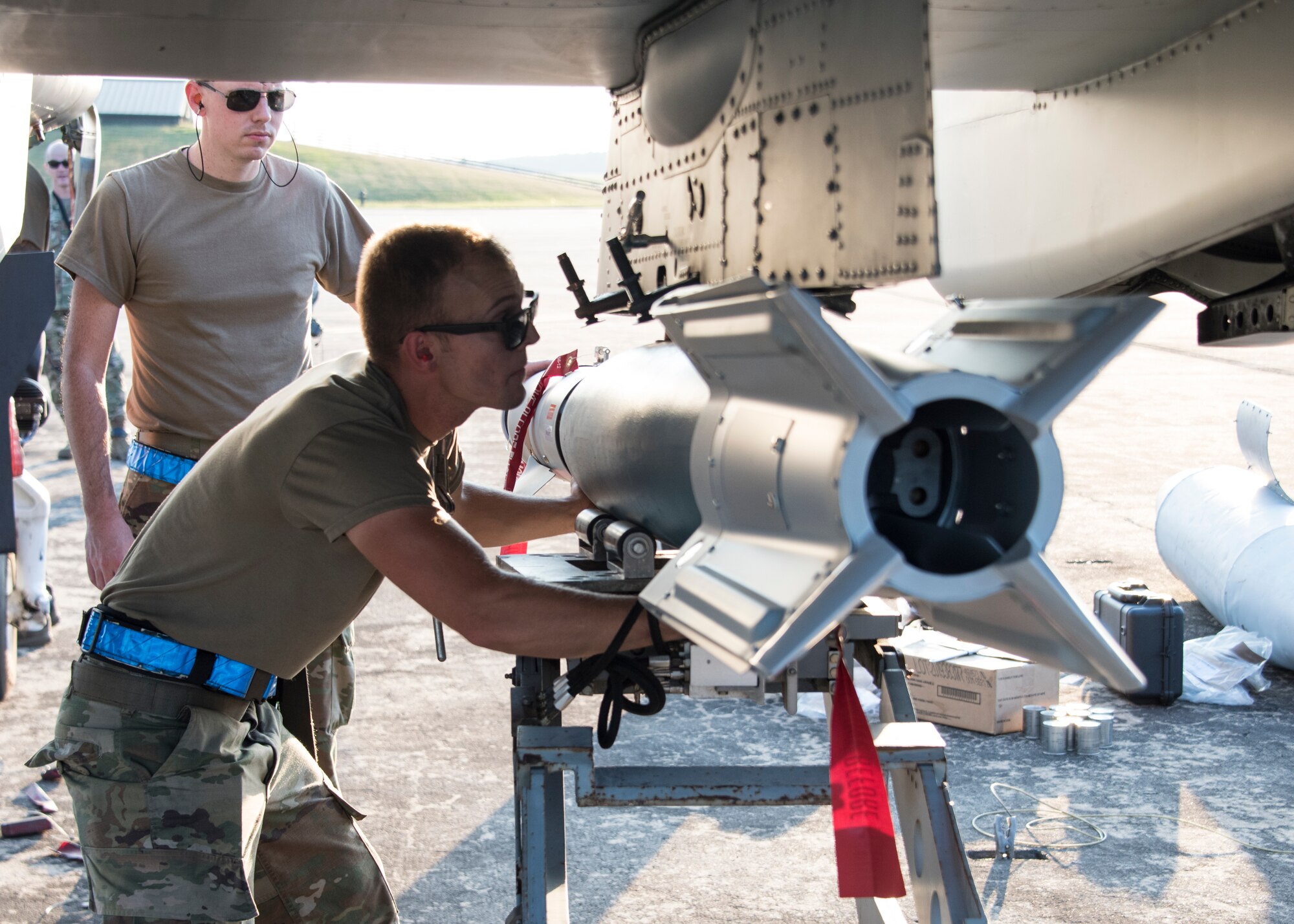 A photo of Airmen building bombs