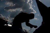 A photo of Airmen building bombs