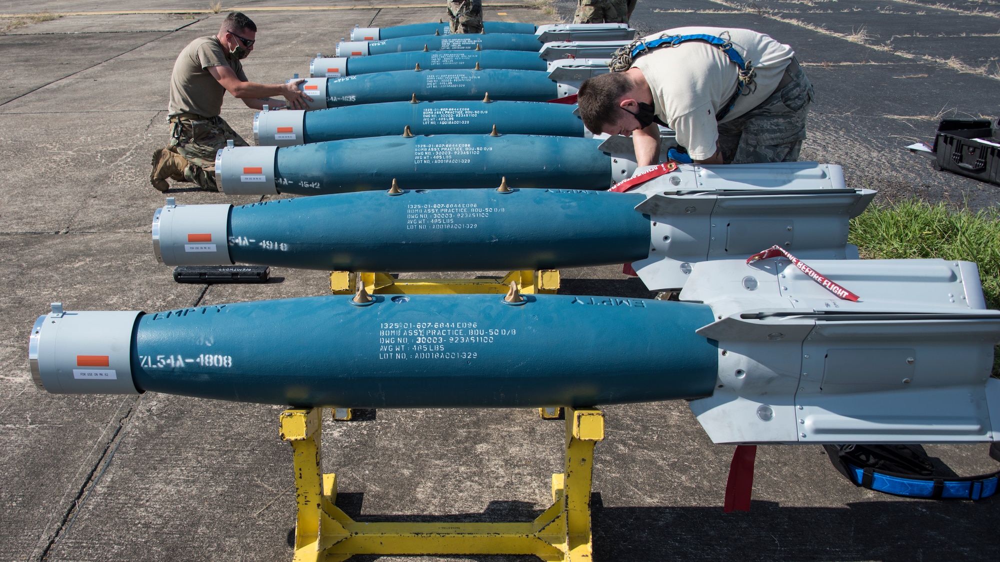 A photo of Airmen building bombs
