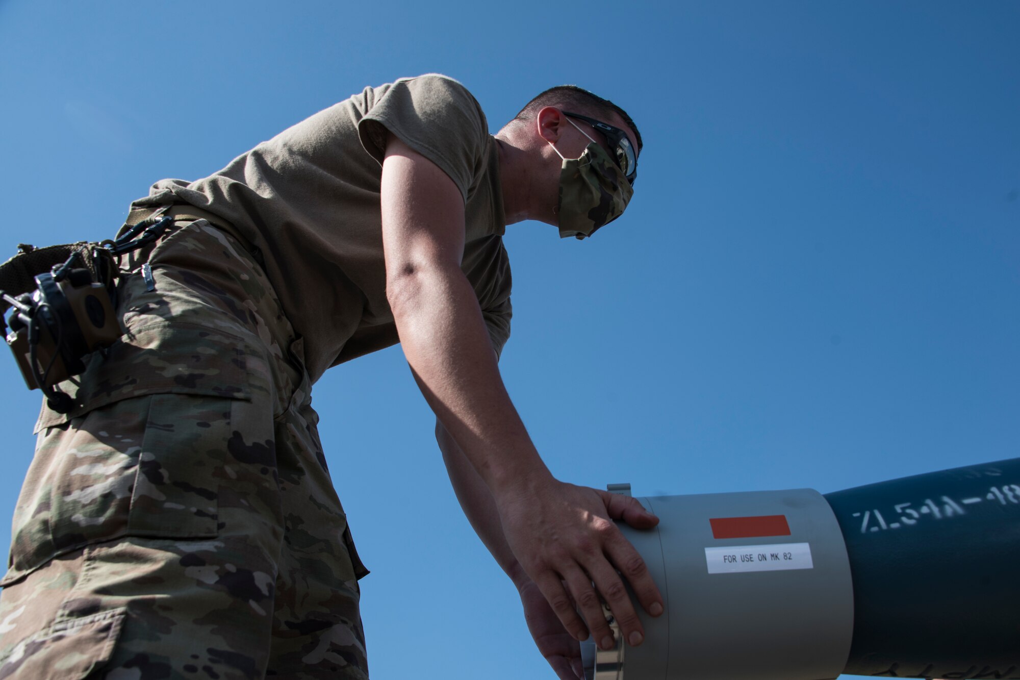 A photo of Airmen building bombs