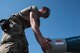 A photo of Airmen building bombs