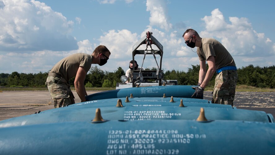 A photo of Airmen building bombs