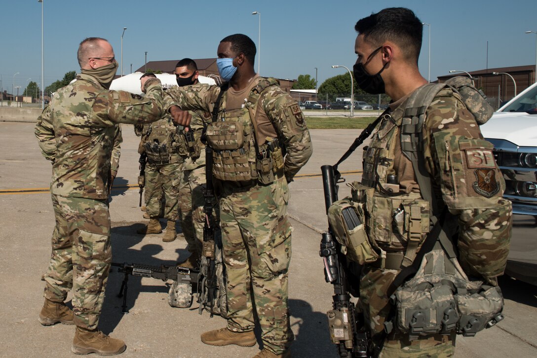 U.S. Air Force Maj. Gen. Mark Weatherington, 8th Air Force and Joint-Global Strike Operations Center commander, and Chief Master Sgt. Melvina Smith, 8th AF command chief, speaks with 509th Security Forces Squadron Airmen during a base familiarization and immersion tour at Whiteman Air Force Base, Missouri, Aug. 25, 2020. Weatherington and Smith met with Airmen and leadership across base to discuss Team Whiteman’s role in the global strike and deterrence mission. (U.S. Air Force photo by Airman 1st Class Christina Carter)