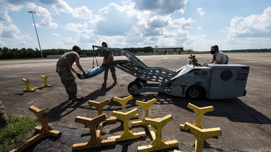 A photo of Airmen building bombs