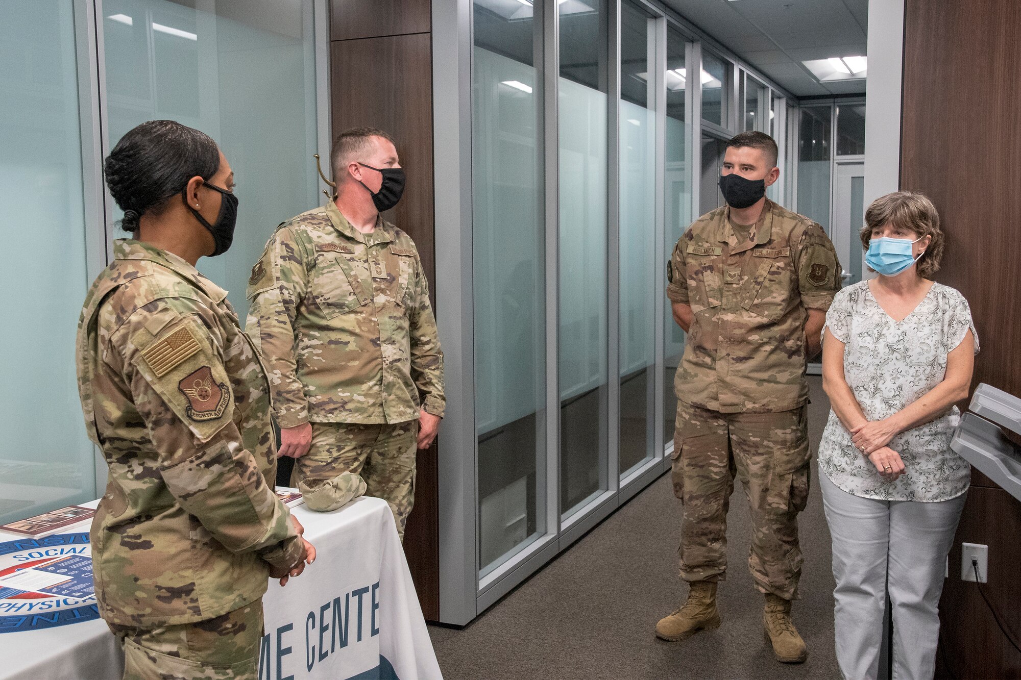 U.S. Air Force Chief Master Sgt. Melvina Smith, 8th AF command chief (left), speaks with Airman resource and support providers at the Silverplate Center during a base familiarization and immersion tour at Whiteman Air Force Base, Missouri, Aug. 25, 2020. Smith met with Airmen and leadership across base to discuss Team Whiteman’s role in the global strike and deterrence mission. (U.S. Air National Guard photo by Tech. Sgt. John Hillier)