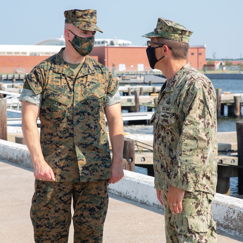 U.S. Marine Corps Brig. Gen. William E. Souza III, Deputy Commander of Marine Forces Reserve and Marine Forces North, left, speaks to Rear Adm. Joseph A. DiGurando, perspective Commander of the Navy Expeditionary Combat Command (NECC), Aug. 27, 2020, on Joint Expeditionary Base Little Creek in Virginia Beach, Virginia. The event familiarized Marine Corps leadership with U.S. Navy capabilities, and provided insight on the mission of Naval Expeditionary Combat Command. (U.S. Marine Corps photo by Sgt. Desmond Martin/released)