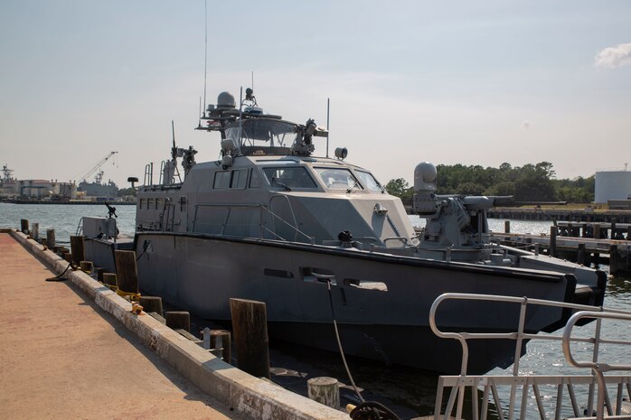 U.S. Navy Sailors with Alpha and Bravo Company, Coastal Rivron Four, Naval Expeditionary Combat Command (NECC) demonstrated the capabilities of the Mark IV Patrol Boat to U.S. Marine Corps Brig. Gen. William E. Souza III, Deputy Commander of Marine Forces Reserve and Marine Forces North, Aug. 27, 2020, on Joint Expeditionary Base Little Creek in Virginia Beach, Virginia. The event familiarized Marine Corps leadership with U.S. Navy capabilities, and provided insight on the mission of Naval Expeditionary Combat Command. (U.S. Marine Corps photo by Sgt. Desmond Martin/released)