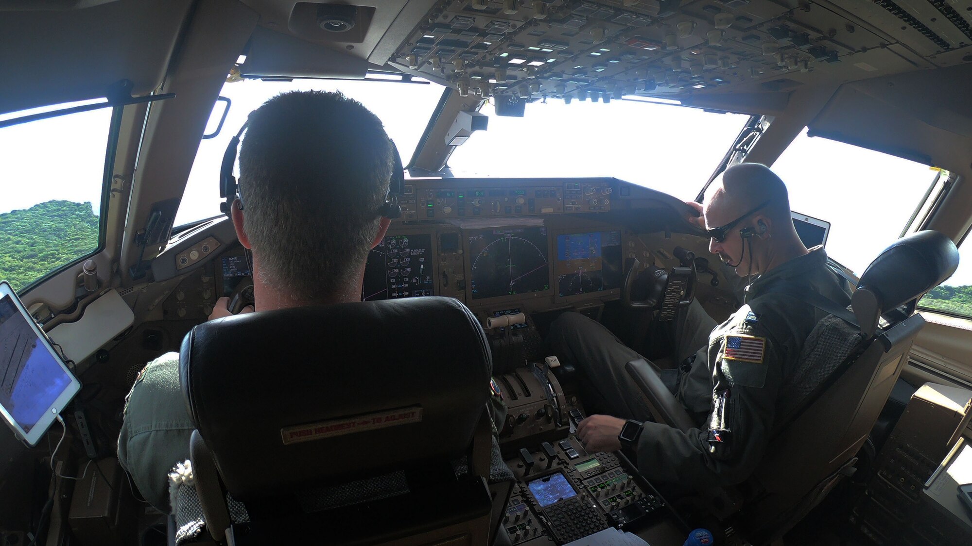Maj. Timothy McBride (left) and Capt. Joe Schubert (right), 924th Air Refueling Squadron pilots, take off from Andersen Air Force Base, Guam, in a KC-46A Pegasus assigned to McConnell Air Force Base, Kansas, Aug. 18, 2020. The KC-46 flew to Andersen as part of the first McConnell-Reserve-lead cargo load mission. The KC-46 can carry 65,000 pounds of cargo.
