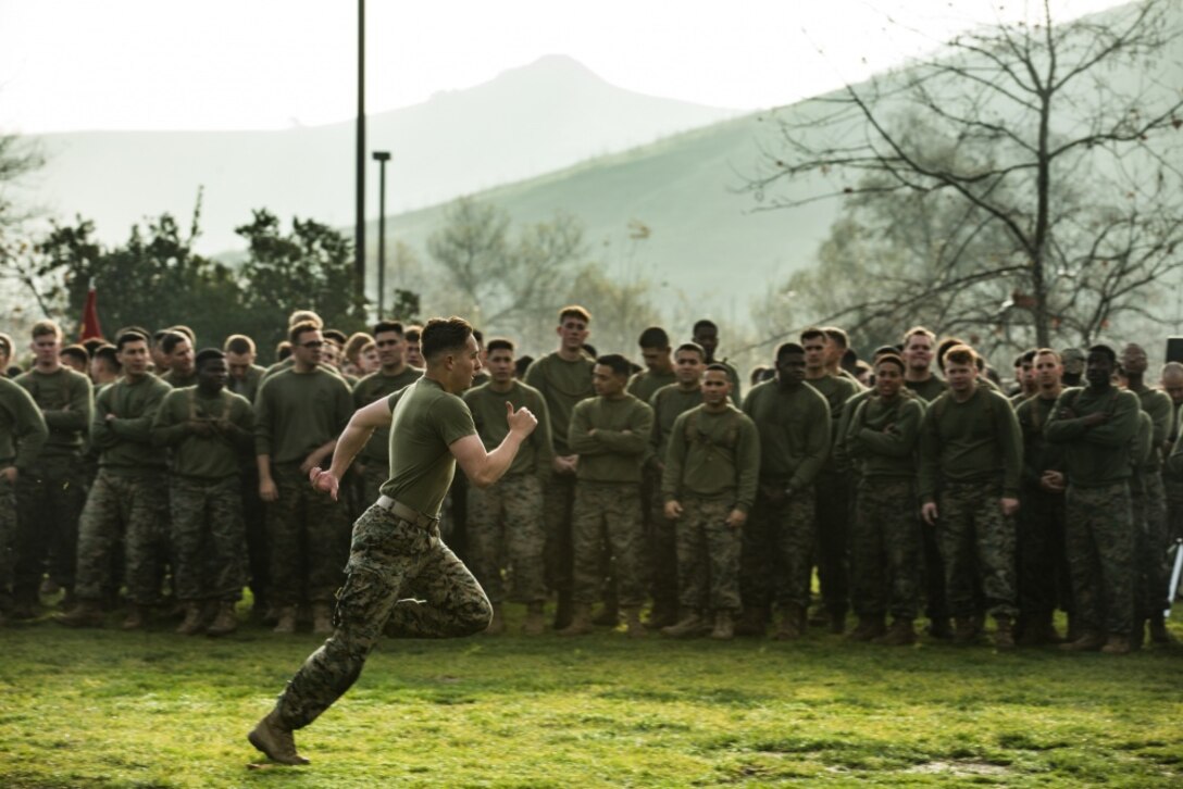U.S. Marines with 11th Marine Regiment participate in a running competition during the annual Saint Barbara's Day Celebration at Marine Corps Base Camp Pendleton, California, Jan. 16, 2020. The regiment conducted a field meet and various competitive training events to celebrate and honor the patron saint of field artillery, Saint Barbara. (U.S. Marine Corps photo by Cpl. Alexa M. Hernandez)