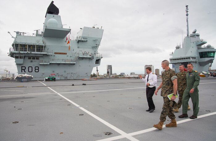 Maj. Gen. Stephen M. Neary tours the flight deck of the HMS Queen Elizabeth in Portsmouth, England, August 27.