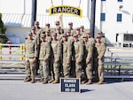 Virginia National Guard First Lt. Aidan O’Connor, front row, third from right, alongside his fellow Ranger School graduates after successfully completing the course.