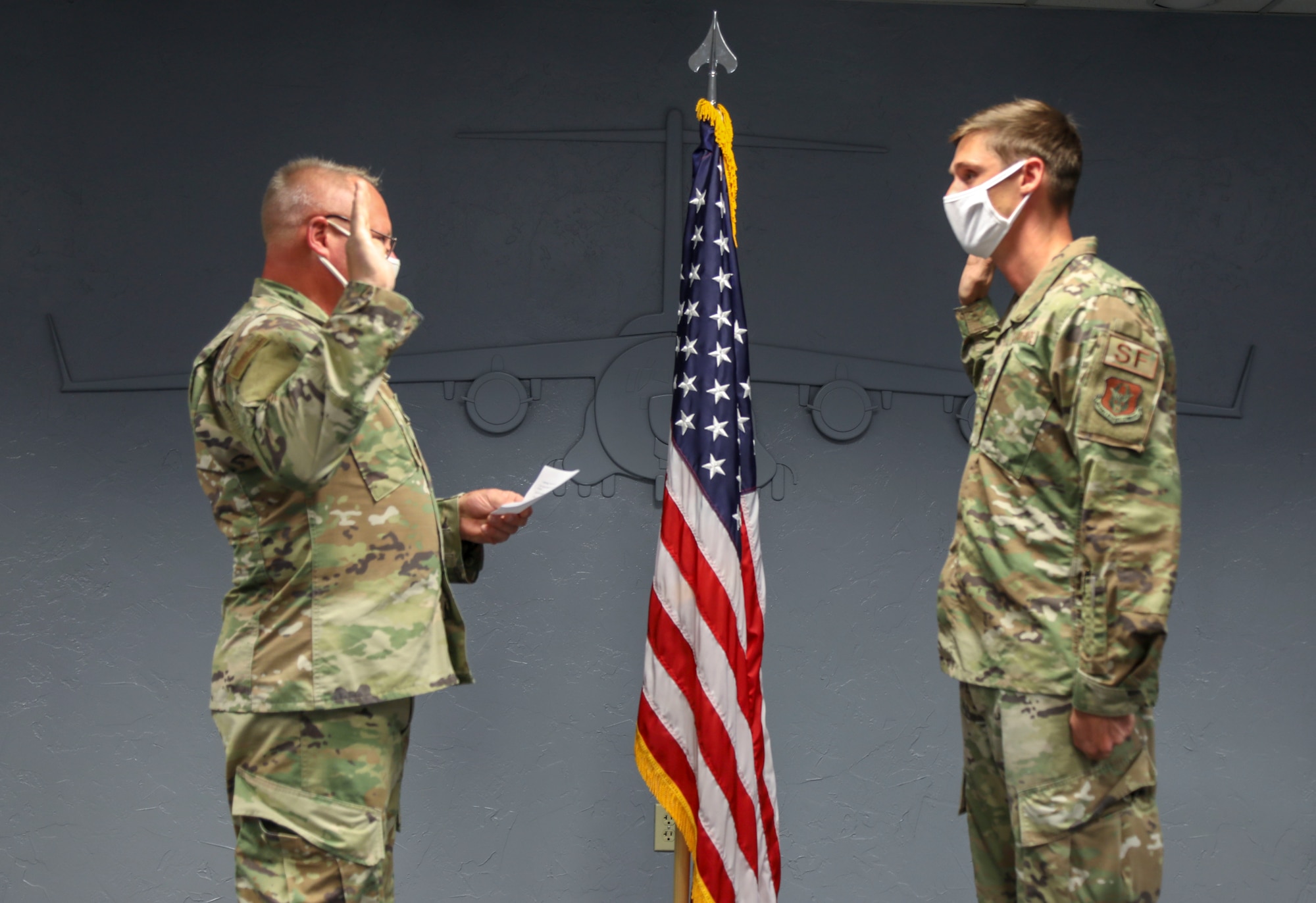 Father re-enlist son into the Air Force Reserve