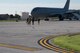 Airmen walking toward aircraft