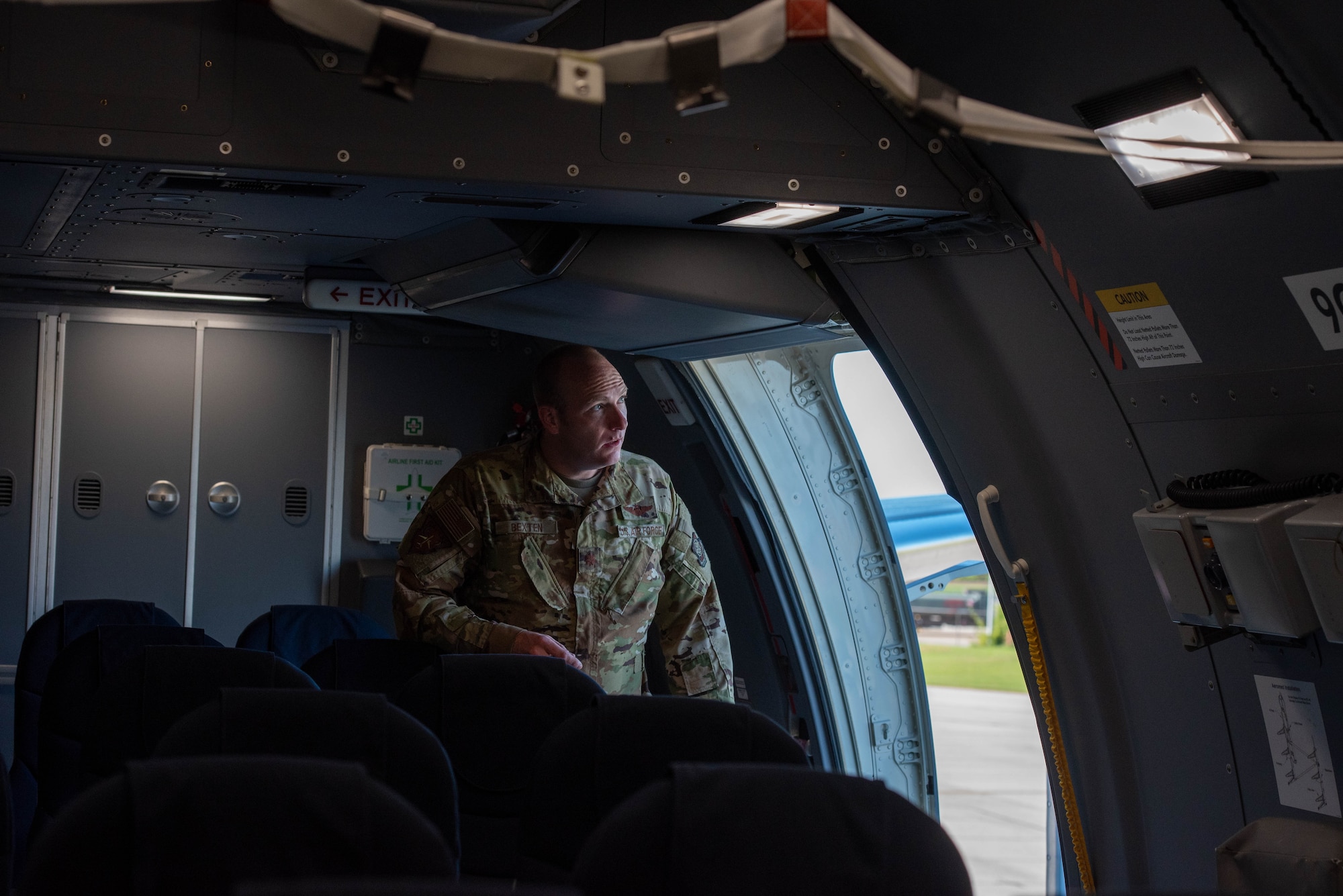 Airman standing in aircraft