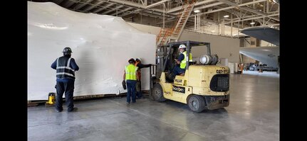 A hypobaric altitude chamber from Tyndall claims the 344th Training Squadron Career Enlisted Aviator Center of Excellence hangar as its new home at Joint Base San Antonio-Lackland, Texas, Aug. 25, 2020.