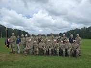 The Army Reserve Service Rifle Team at the 59th Interservice Rifle Championships at the Marine Corps Base in Quantico, Virginia. Back row (L to R): SPC Mason Petersen, Mr. Jon Casillas, COL Christopher Baer, CW3 Joseph Hayes, SFC Richard Hartley, SSG Sean Morris, MAJ David Yerkes, MSG Joseph Braswell, SFC John Arcularius, SFC Adam Stauffer, SSG Matt Goad, Mr. Stephen Austin (ACAR), MSG Howard Griffith. Front row (L to R): 2LT Jack Pitman, CDT Cameron Bates, SPC Dan Lowe, SGT Drew Wood, SGT Keith Stephens, SFC Cheryl Morris, SFC John Bonjour, SFC Dan Dorosheff.