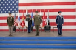 U.S. Army Gen. James Dickinson, U.S. Space Command commander; U.S. Marine Corps Master Gunnery Sgt. Scott Stalker; and U.S. Space Force Chief Master Sgt. Roger Towberman stand at attention during USSPACECOM's change of responsibility ceremony Aug. 28, 2020, at Peterson Air Force Base, Colorado. Stalker assumed responsibility as USSPACECOM’s command senior enlisted leader from Towberman during the ceremony. This was USSPACECOM’s first change of responsibility since the command was established Aug. 29, 2019.