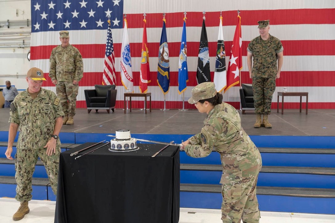 U.S. Air Force Staff Sgt. Kiara Kashner, right, and U.S. Navy Rear Adm. Michael Bernacchi, representing U.S. Space Command’s longest-serving and junior-serving members, respectively, cut a cake in honor of the combatant command’s first birthday Aug. 28, 2020, at Peterson Air Force Base, Colorado. Kashner serves as executive assistant to the commandant and Bernacchi is Strategy, Plans and Policy director. USSPACECOM was officially established Aug. 29, 2019, during a ceremony in the White House Rose Garden with President Donald Trump; Dr. Mark T. Esper. Secretary of Defense; and Gen. John W. “Jay” Raymond, former USSPACECOM commander and current U.S. Space Force Chief of Space Operations; and Chief Master Sgt. Roger Towberman, former USSPACECOM command senior enlisted leader and current USSF CSEL.