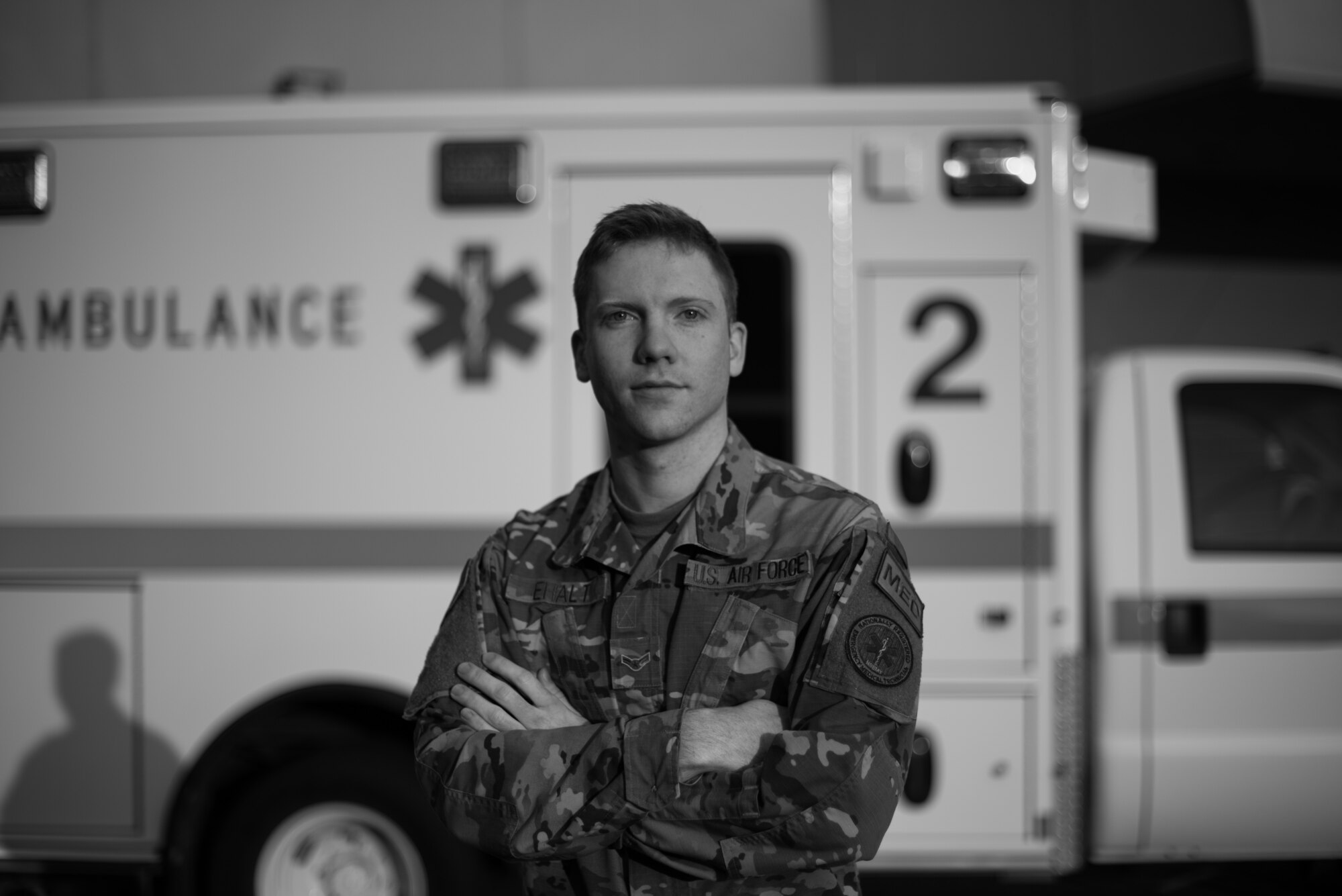 U.S. Air Force Airman 1st Class Brody Ehault, 60th Medical Operations Squadron emergency medical technician, stands in front of an ambulance Aug. 26, 2020, at Travis Air Force Base, California. Ehault was part of a team that evacuated 20 patients from David Grant USAF Medical Center Aug. 19 as the LNU Lightning Complex Fire, the second largest wildfire in California history, burned its way toward the base. (U.S. Air Force photo by Senior Airman Cameron Otte)