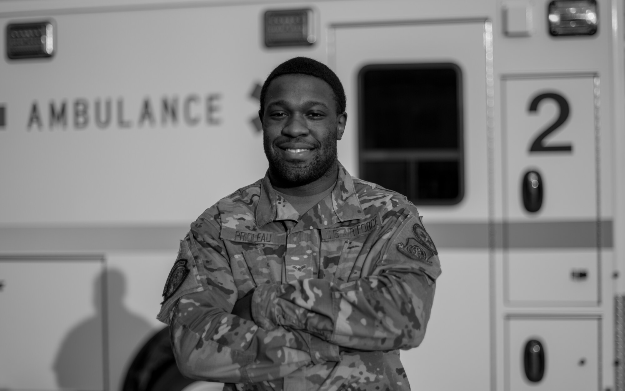 U.S. Air Force Airman 1st Class Jaheem Prioleau, 60th Medical Operations Squadron emergency medical technician, stands in front of an ambulance Aug. 26, 2020, at Travis Air Force Base, California. Prioleau was part of a team that evacuated 20 patients from David Grant USAF Medical Center Aug. 19 as the LNU Lightning Complex Fire, the second largest wildfire in California history, burned its way toward the base. (U.S. Air Force photo by Senior Airman Cameron Otte)