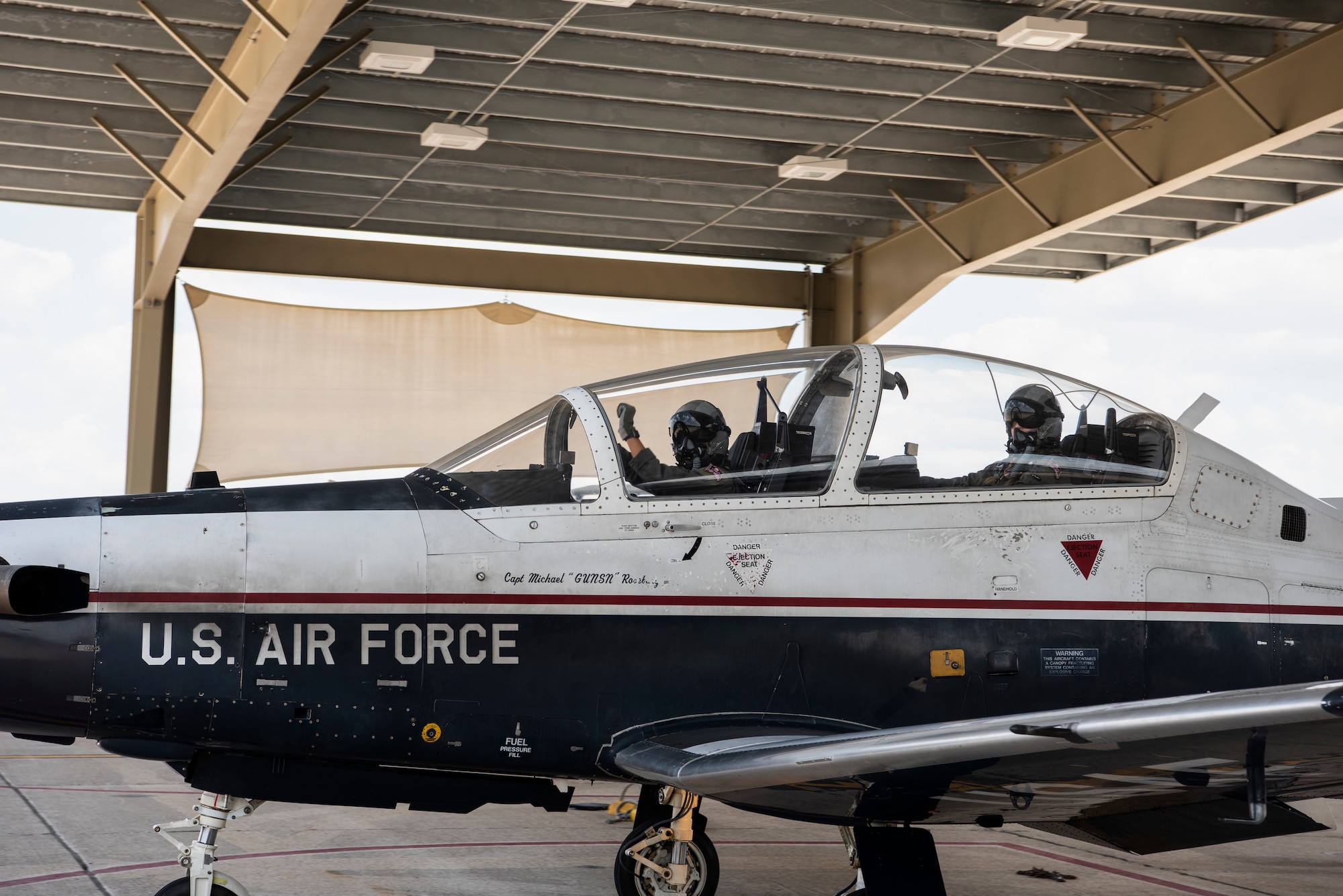 Capt. Kimberly Bray, 47th Operations Support Squadron executive officer and instructor pilot, and 1st Lt. Sarah Fotsch, a 434th Flying Training Squadron instructor pilot, taxi in a T-6A Texan II at Laughlin Air Force Base, Texas, Aug. 27, 2020. Bray and Fotsch flew in a all-female formation sortie as part of Laughlin’s observence of Women’s Equality Day. (U.S. Air Force photo by Senior Airman Marco A. Gomez)