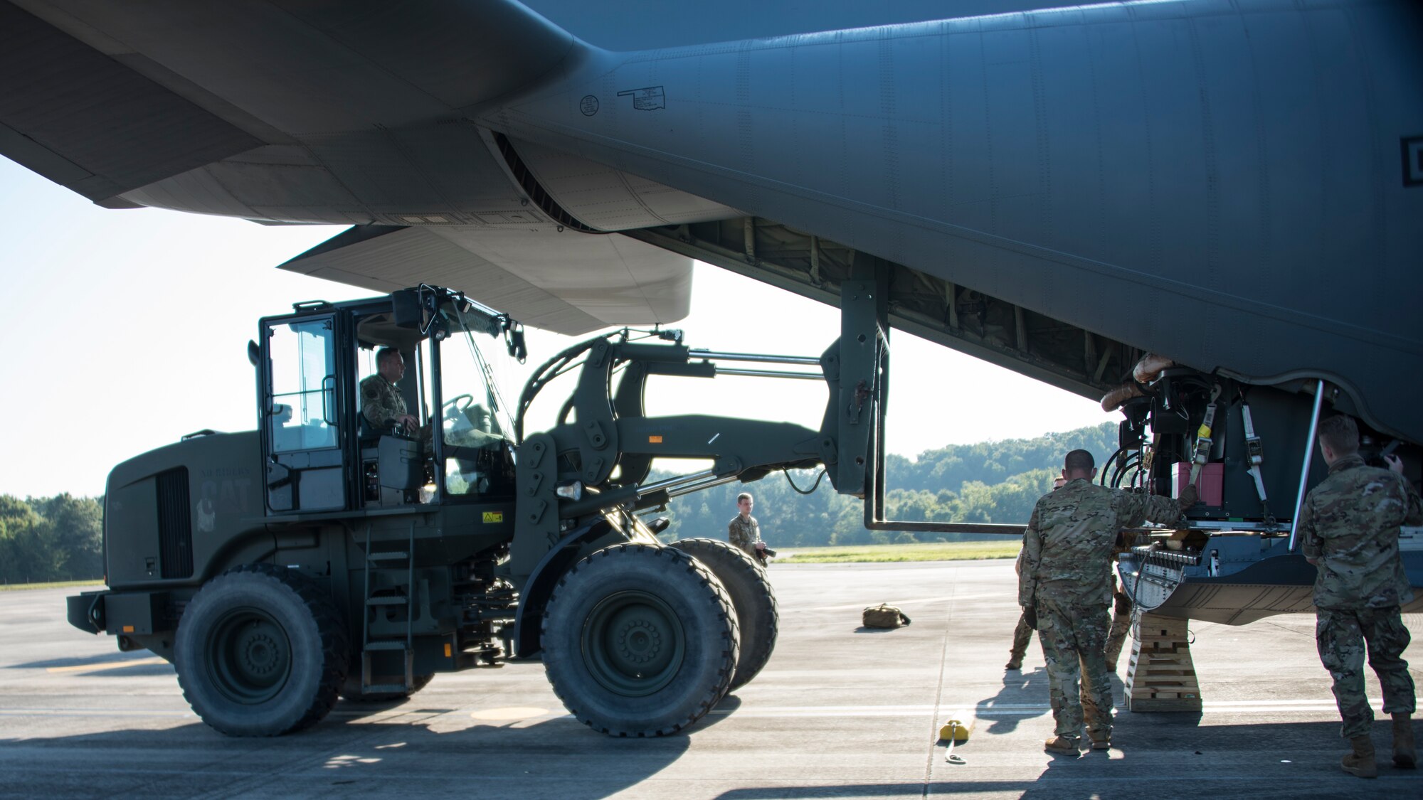 A photo of Airmen loading cargo