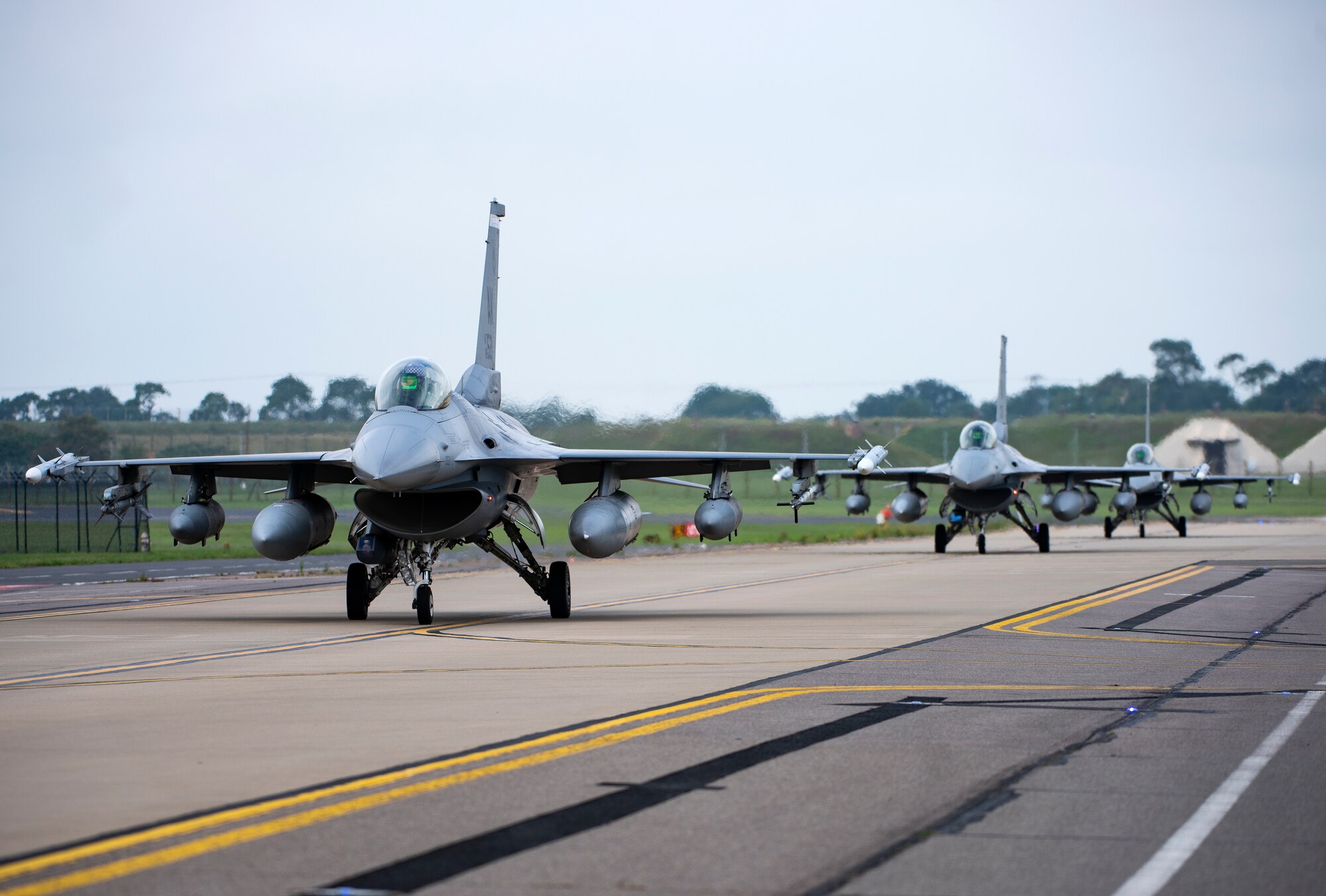 U.S. Air Force F-16 Fighting Falcons, assigned to the 510th Fighter Squadron, Aviano Air Base, Italy, arrive at Royal Air Force Lakenheath, England, Aug. 28, 2020. Aircraft and Airmen from the 510th FS are participating in a flying training deployment event to enhance interoperability, maintain joint readiness and strengthen relationships with regional allies and partners. (U.S. Air Force photo by Airman 1st Class Jessi Monte)
