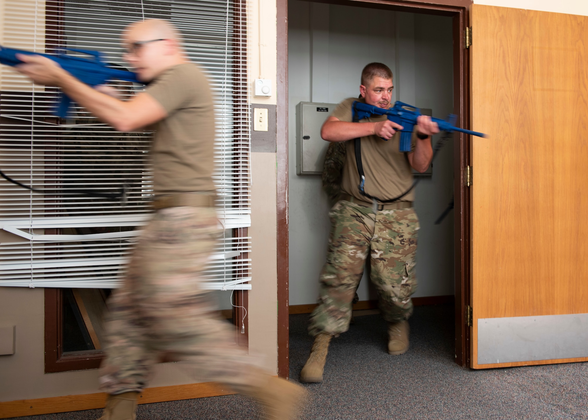 Security Airmen clearing a room during practice