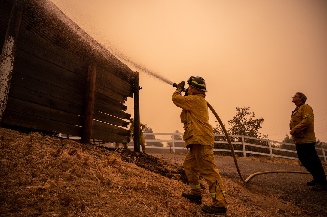 Travis firefighters help community battle Solano wildfires