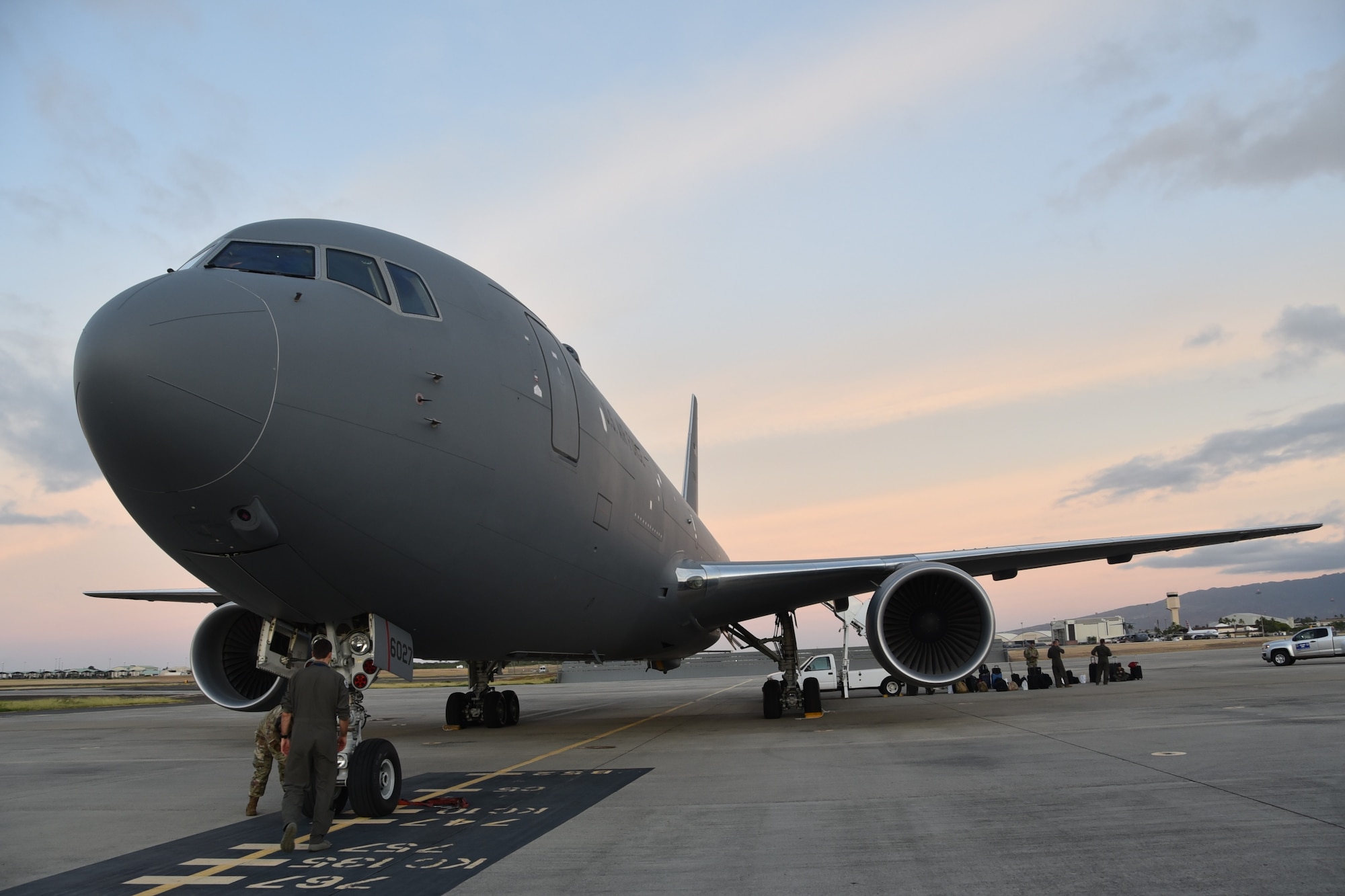 A KC-46A Pegasus assigned to the 22nd Air Refueling Wing at McConnell Air Force Base, Kansas, prepares for takeoff Aug. 21, 2020, at Hickam Air Force Base, Hawaii.  The KC-46 was part of the first 931st Air Refueling Wing-lead cargo mission which helped offload more than 11,000 pounds of pallets to four locations worldwide in six days.