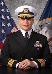 Official portrait of Capt. Daniel Prochazka, the executive officer of Nimitz-class aircraft carrier USS Harry S. Truman (CVN 75)