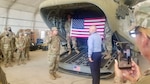 U.S. Army Spc. Daniel Rivera, a Michigan National Guard Soldier and CH-47 helicopter repairer deployed with Bravo Company, 628th Aviation Support Battalion, 28th Expeditionary Combat Aviation Brigade, takes the oath of allegiance during a naturalization ceremony at the 28th ECAB's mobilization station.