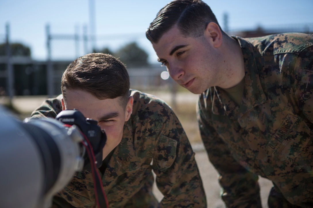 U.S. Marines test a Canon 600 millimeter lens with a 2x magnification attachment on Marine Corps Air Station Cherry Point, N.C. March 3.