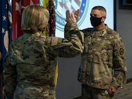 U.S. Army Lt. Gen. Laura J. Richardson, left, U.S. Army North (Fifth Army) Commanding General, administers the oath of office to U.S. Army Maj. Gen. Jeffery P. Van, Joint Task Force-Civil Support (JTF-CS) incoming commander, during a promotion ceremony at JTF-CS headquarters at Joint Base Langley-Eustis, Virginia, Aug. 28, 2020.  As prescribed in Section 3331, Title 5, United States Code, the oath of office is not required for officer promotions but is tradition in the officer corps to reaffirm the member’s commitment to service. (U.S. Air Force photo by Staff Sgt. Chandler Baker)