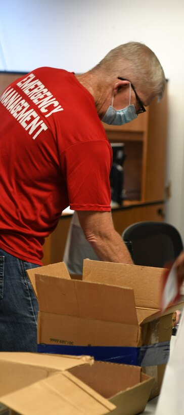 Man packing boxes