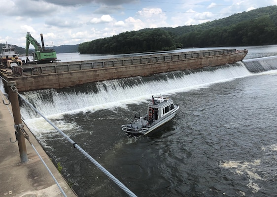 District boat scanning the riverbed downstream of the dam (U.S. Army photo by Joe Premozic)