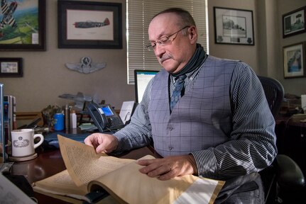 Gary W. Boyd, Air Education and Training Command historian, reads through documents of the formation of Randolph Field July 28, 2020 at Joint Base San Antonio-Randolph, Texas. A respected researcher and writer of history, Boyd has lived through several significant periods of history—all of which he believes has determined our present and shapes our future.