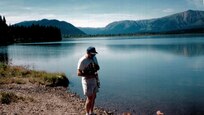 Gary W. Boyd, Air Education and Training Command historian, plays his soprano saxophone outside on a trip. (Courtesy photo)