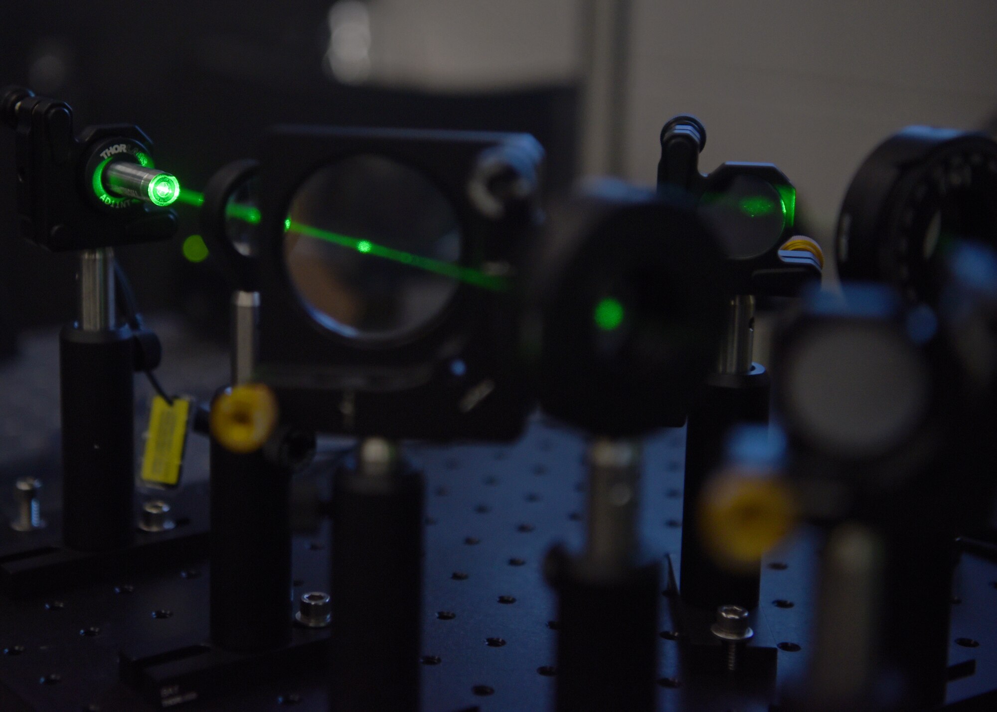 The 312th Training Squadron Special Instruments Training course’s laser interferometer powers up during a lesson, inside the Louis F. Garland Department of Defense Fire Academy on Goodfellow Air Force Base, Texas, Aug. 19, 2020. The laser merged two light sources and created an interference pattern, which could be measured and analyzed by SPINSTRA students. (U.S. Air Force photo by Senior Airman Abbey Rieves)