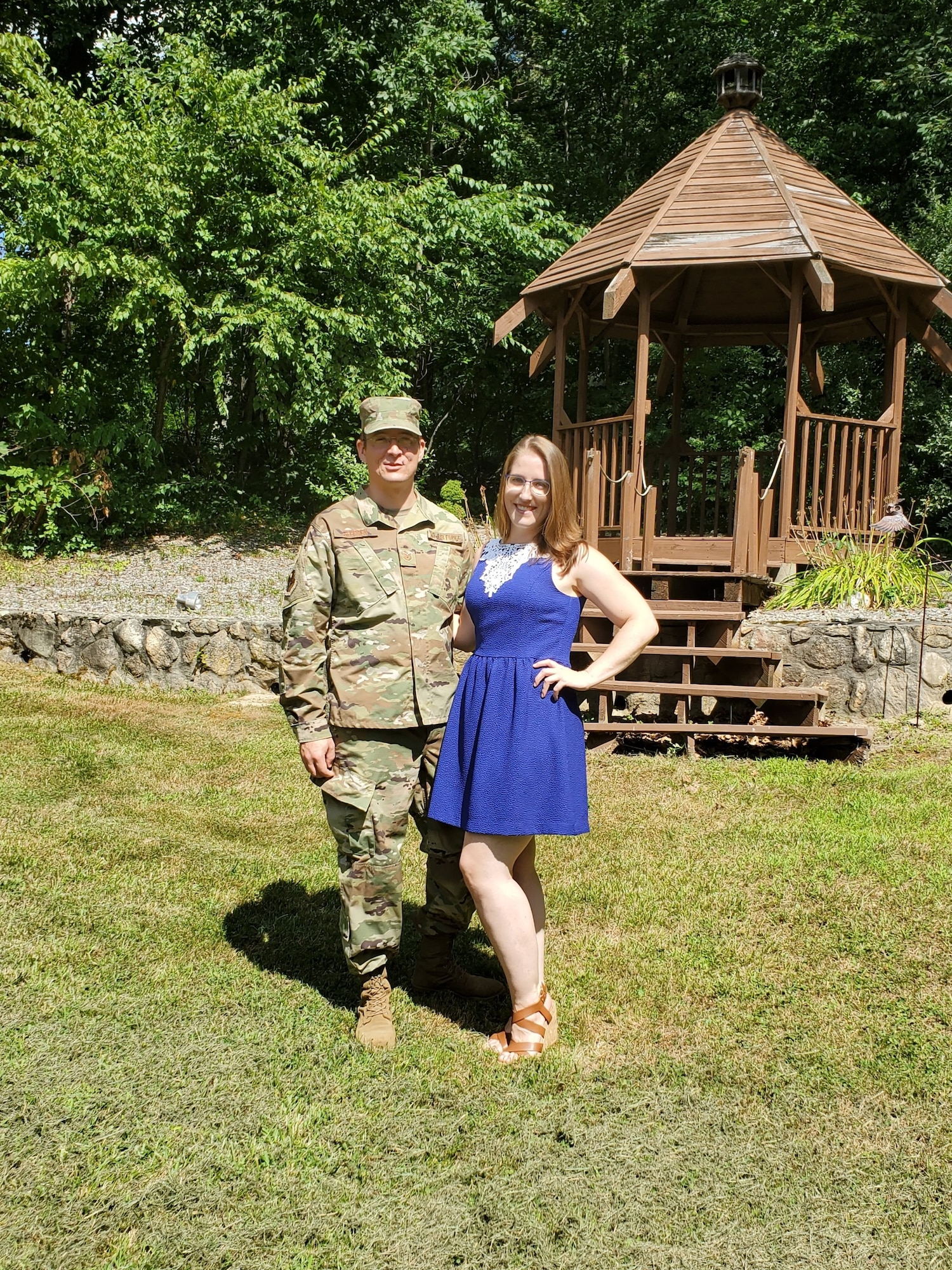 Tech. Sgt. George Seerden, 960th Cyberspace Operations Group NCO in charge of Standards and Evaluations, stands next to his significant other, Janelle, in his backyard Aug. 1, 2020, Johnston, Rhode Island. (Courtesy photo by Justine Boucher)