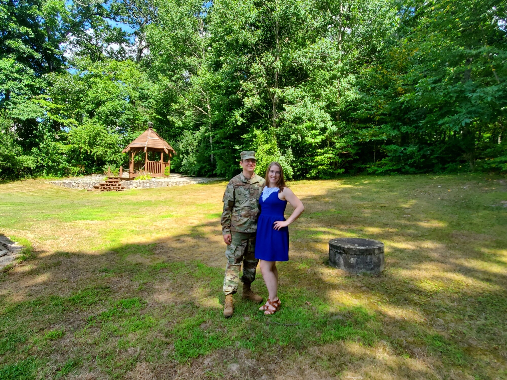 Tech. Sgt. George Seerden, 960th Cyberspace Operations Group NCO in charge of Standards and Evaluations, stands next to his significant other, Janelle, in his backyard Aug. 1, 2020, Johnston, Rhode Island. (Courtesy photo by Justine Boucher)