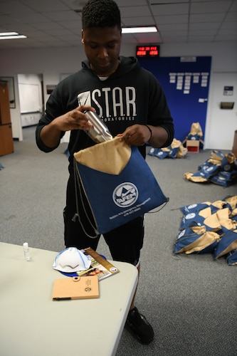 Airman filling bag