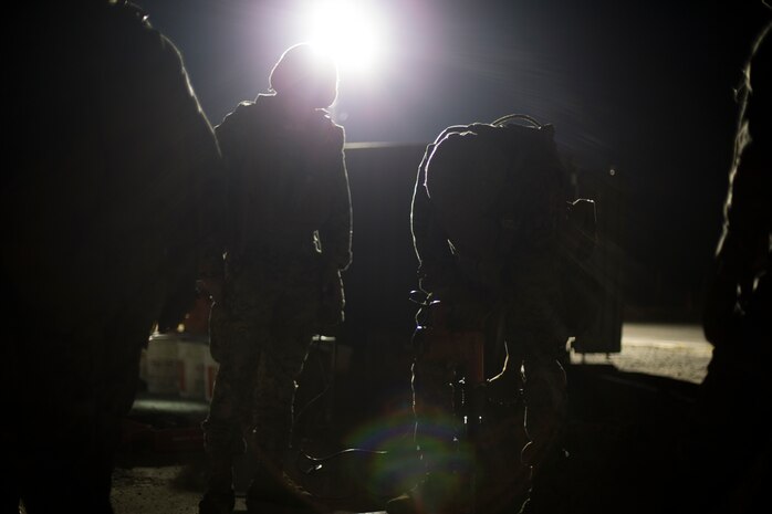 U.S Marines with Marine Wing Support Squadron 171 repair damage to a concrete slab that simulates damage to an airfield during Exercise Active Shield aboard Marine Corps Air Station (MCAS) Iwakuni, Japan, Oct. 29, 2020. Active Shield is an annual bilateral exercise partnering U.S. and Japanese forces for the protection and defense of MCAS Iwakuni and other assets in the region in order to sustain military operations in support of the U.S.-Japan Alliance. (U.S. Marine Corps photo by Lance Cpl. Bryant Rodriguez)