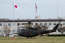 Japan Ground Self-Defense Force (JGSDF) Maj. Gen. Yasuyuki Kodama, commander of the 13th Brigade, arrives in a UH-1 Iroquois helicopter during Exercise Active Shield aboard Marine Corps Air Station (MCAS) Iwakuni, Japan, Oct. 28, 2020. The purpose of the visit was to observe U.S. and JGSDF service members working together during the exercise. Active Shield is an annual bilateral exercise partnering U.S. and Japanese forces for the protection and defense of MCAS Iwakuni and other assets in the region in order to sustain military operations in support of the U.S.-Japan Alliance. (U.S. Marine Corps photo by Lance Cpl. Tyler Harmon)