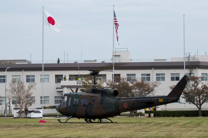 Japan Ground Self-Defense Force (JGSDF) Maj. Gen. Yasuyuki Kodama, commander of the 13th Brigade, arrives in a UH-1 Iroquois helicopter during Exercise Active Shield aboard Marine Corps Air Station (MCAS) Iwakuni, Japan, Oct. 28, 2020. The purpose of the visit was to observe U.S. and JGSDF service members working together during the exercise. Active Shield is an annual bilateral exercise partnering U.S. and Japanese forces for the protection and defense of MCAS Iwakuni and other assets in the region in order to sustain military operations in support of the U.S.-Japan Alliance. (U.S. Marine Corps photo by Lance Cpl. Tyler Harmon)