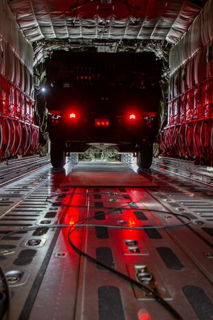 U.S. Marines with Marine Aerial Refueler Transport Squadron 152 (VMGR-152) and Marine Air Control Group 18 (MACG-18) conduct load operations at Marine Corps Air Station Futenma, Okinawa, Japan, Nov. 9, 2020. This is the first time VMGR-152 and MACG-18 have worked together to load an AN/TPS-80 Ground/Air Task Oriented Radar system onto a KC-130J Super Hercules aircraft. (U.S. Marine Corps photo by Lance Cpl. Dalton J. Payne)
