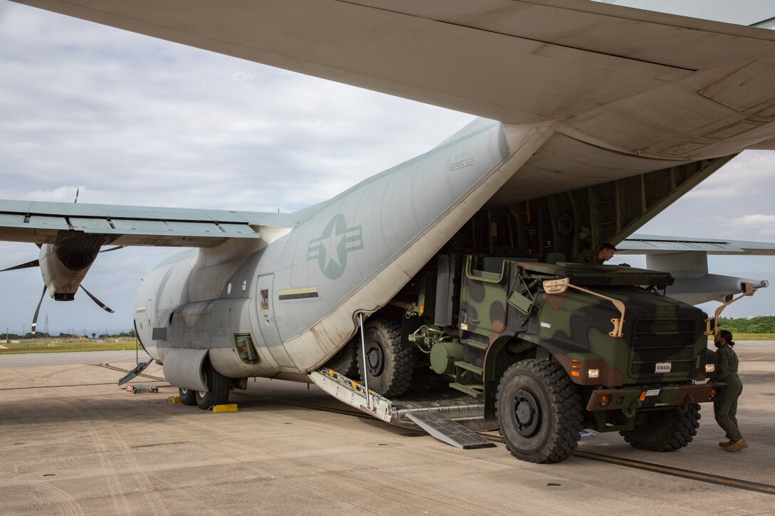 U.S. Marines with Marine Aerial Refueler Transport Squadron 152 (VMGR-152) and Marine Air Control Group 18 (MACG-18) conduct load operations at Marine Corps Air Station Futenma, Okinawa, Japan, Nov. 9, 2020. This is the first time VMGR-152 and MACG-18 have worked together to load an AN/TPS-80 Ground/Air Task Oriented Radar system onto a KC-130J Super Hercules aircraft. (U.S. Marine Corps photo by Lance Cpl. Dalton J. Payne)